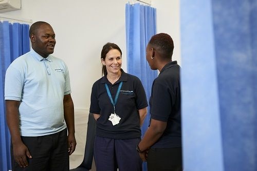 Image of three hospital workers