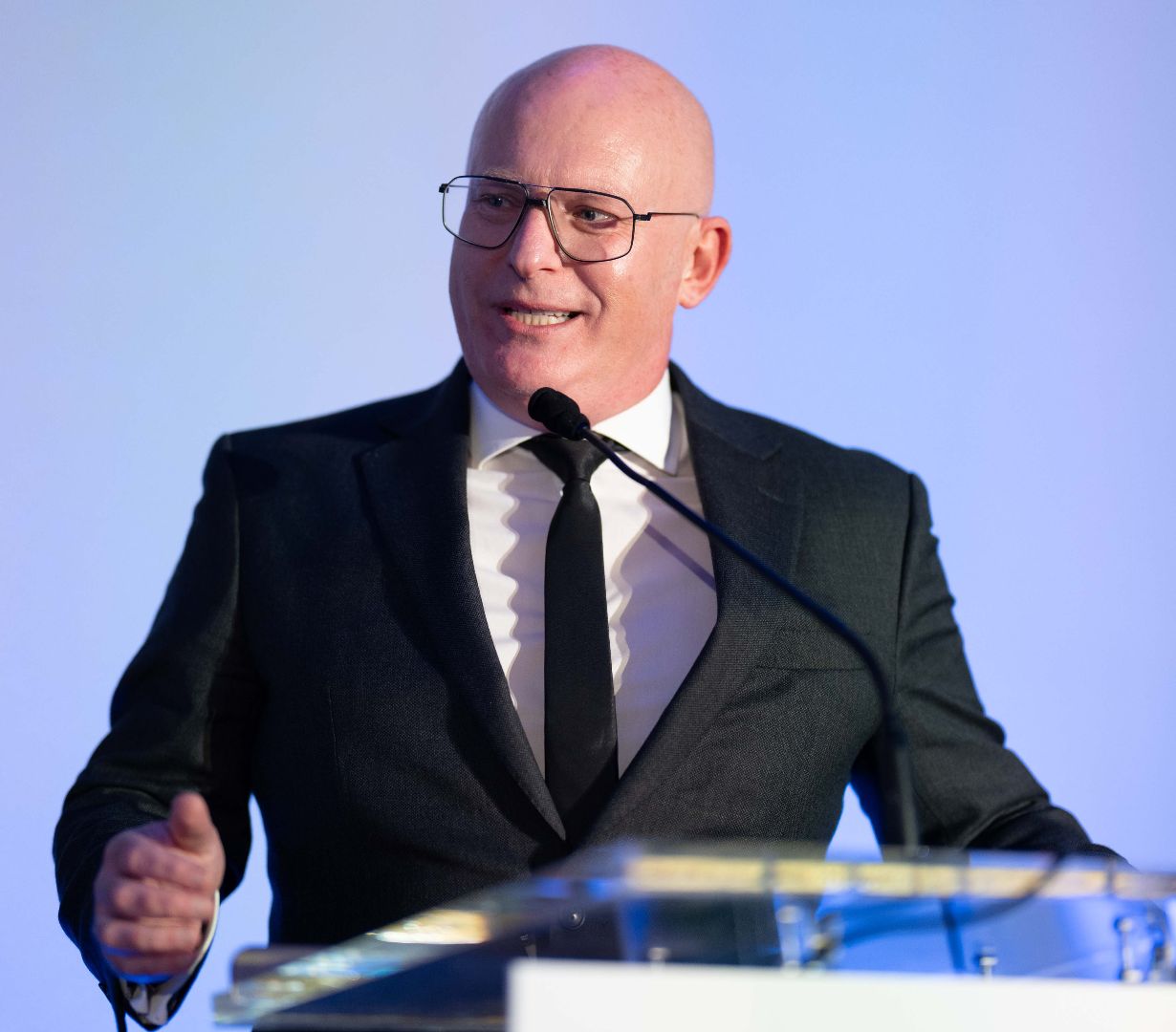 James BEnson on lectern.jpg